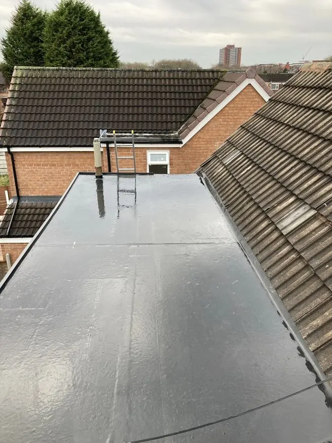 Flat roof with new black waterproof coating